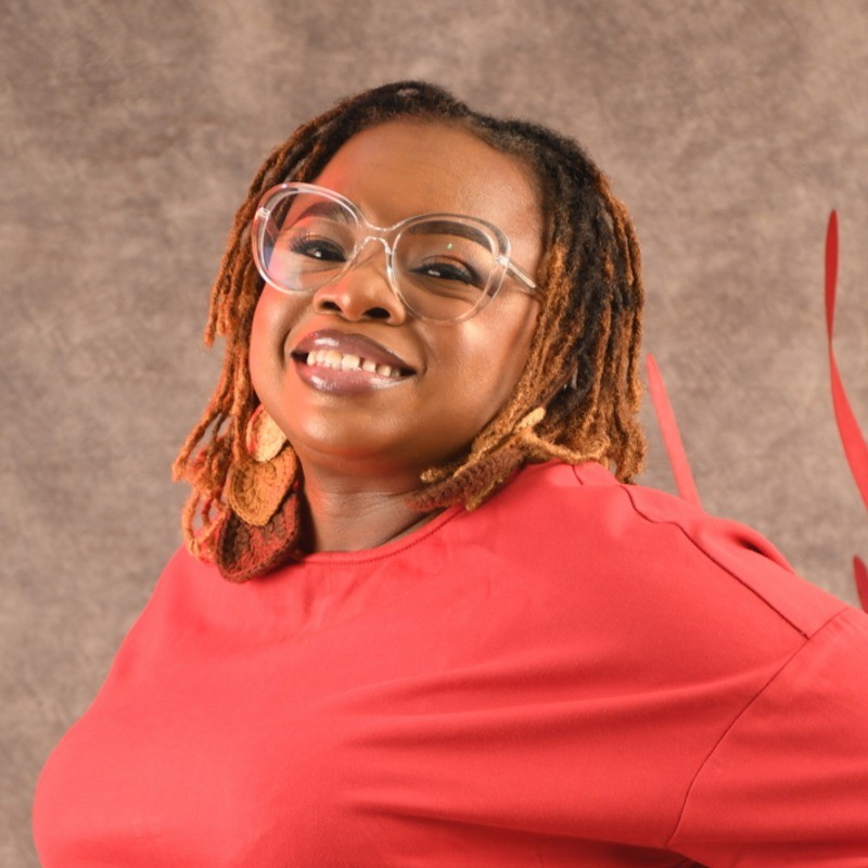 Image of Victoria (MsVick) Alli-Johnson smiling